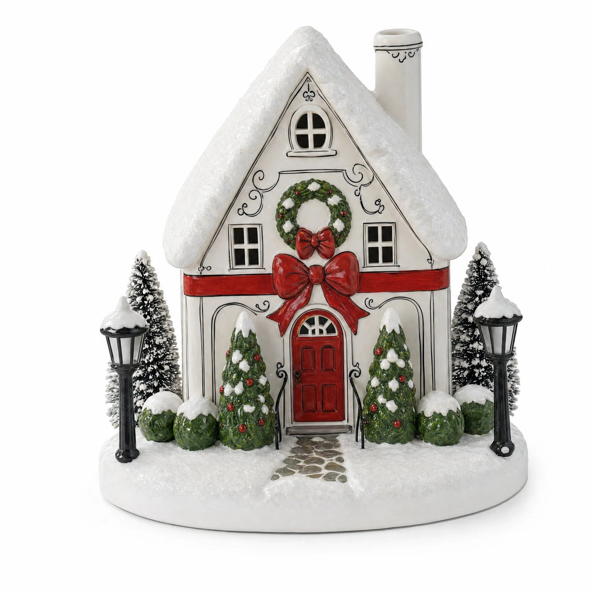Snowdrift Cottage Christmas diffuser with snow-covered roof and red bow
